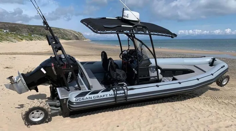 Slide: The Image of 2022 Ocean Craft Marine 8.4 M Amphibious boat on sandy beach. - 1