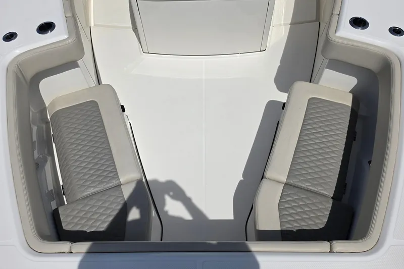 Slide: The Image of Interior seating of 2025 Solace 37CS boat with quilted cushions. - 22