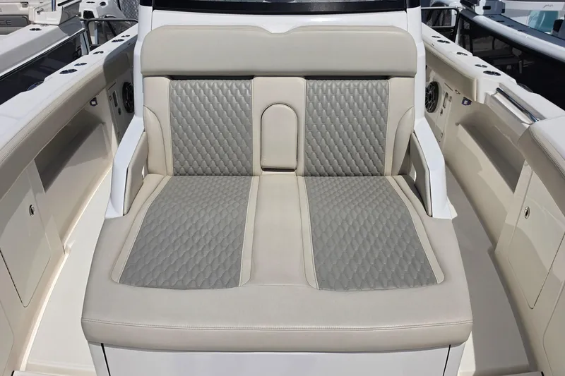 Slide: The Image of Luxurious seating on 2025 Solace 37CS boat, featuring elegant quilted upholstery design. - 25