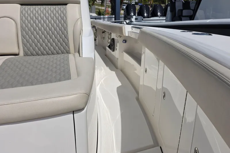Slide: The Image of Luxurious seating and storage on the 2025 Solace 37CS boat deck. - 33
