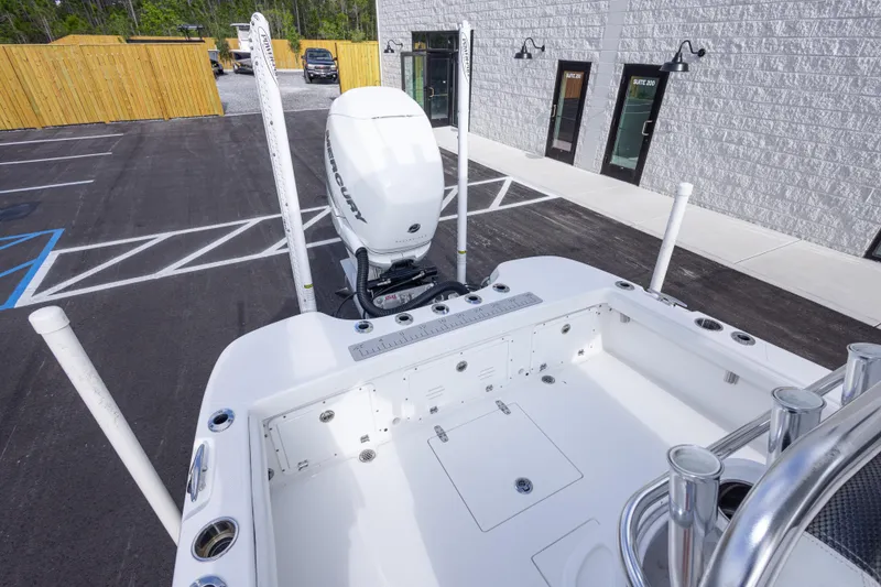 Slide: The Image of 2022 BlackJack 256 Coastal boat with Mercury engine in parking lot. - 17
