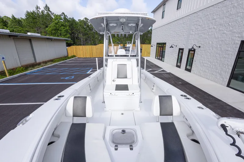 Slide: The Image of 2022 BlackJack 256 Coastal boat in parking lot, showcasing sleek design and spacious interior. - 28