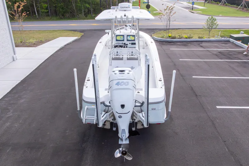 Slide: The Image of 2022 BlackJack 256 Coastal boat with powerful outboard motor in parking lot. - 43