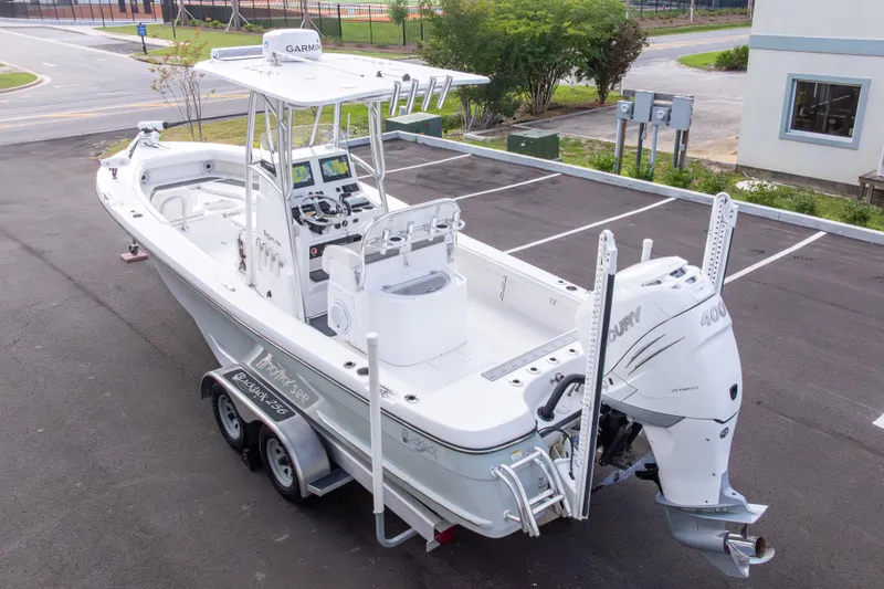 Slide: The Image of 2022 BlackJack 256 Coastal boat with Garmin equipment and Mercury engine on a trailer. - 44