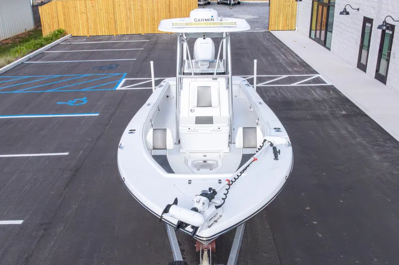 Slide: The Image of 2022 BlackJack 256 Coastal boat in parking lot, featuring Garmin equipment. - 47