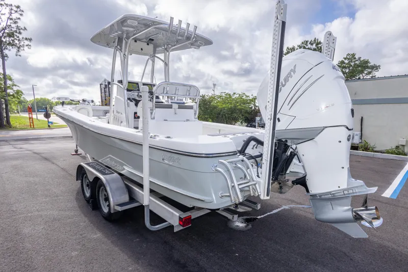 Slide: The Image of 2022 BlackJack 256 Coastal boat on trailer with powerful outboard motor. - 7