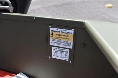 Slide: The Image of 2025 Lowe L1648M Jon boat capacity label, showing maximum of 4 persons or 565 lbs. - 14