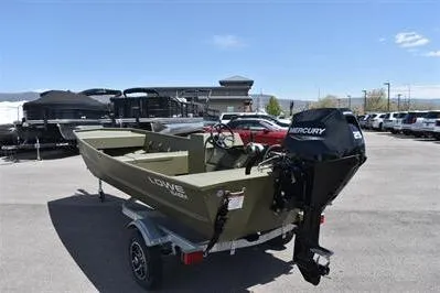 Slide: The Image of 2025 Lowe L1648M Jon boat with Mercury motor on trailer in parking lot. - 2