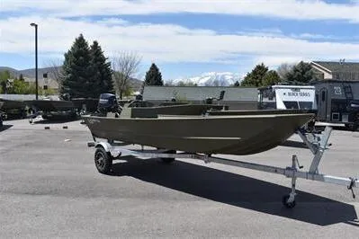 Slide: The Image of 2025 Lowe L1648M Jon boat on trailer in outdoor parking lot. - 5