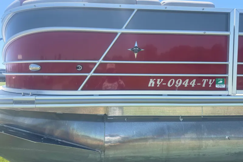 Slide: The Image of 2019 Berkshire 23RFX STS pontoon boat with red and silver exterior, registration KY-0944-TY. - 3