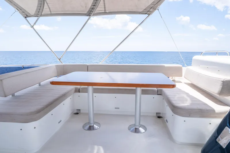 Slide: The Image of Luxurious seating area on 2025 Sirena 58 yacht with ocean view. - 10