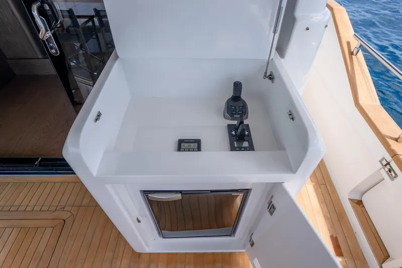 Slide: The Image of Modern control station on 2025 Sirena 58 yacht, featuring sleek design and advanced navigation equipment. - 28