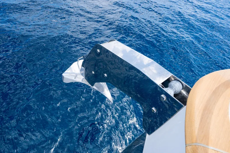 Slide: The Image of Anchor detail of 2025 Sirena 58 yacht against blue ocean backdrop. - 39