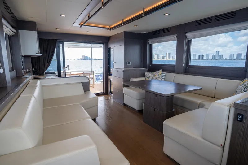 Slide: The Image of Luxurious interior of 2025 Sirena 58 yacht with elegant seating and ocean view. - 46