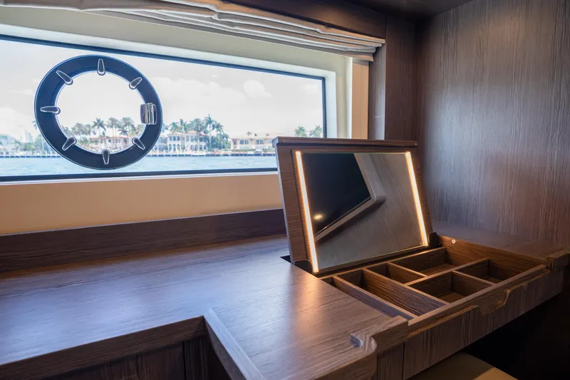 Slide: The Image of Luxurious interior of 2025 Sirena 58 yacht with vanity and ocean view. - 61