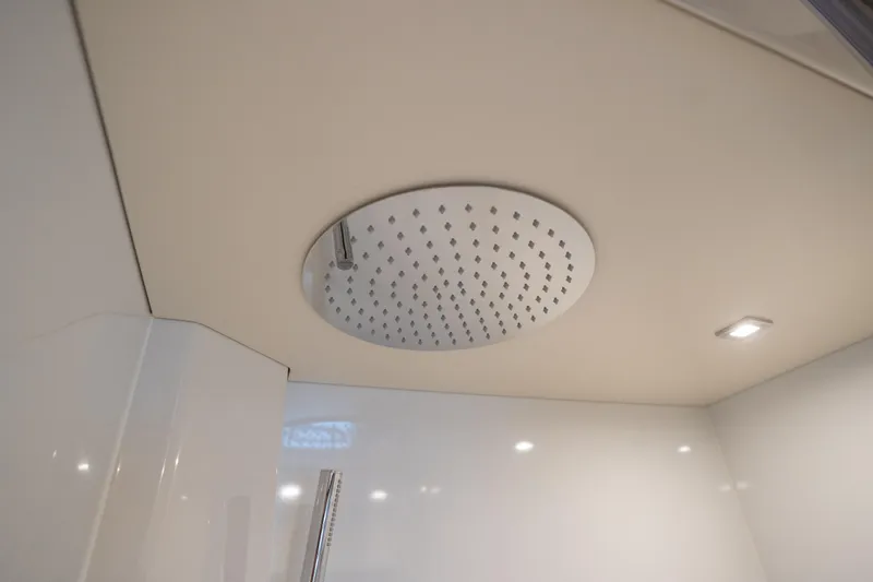 Slide: The Image of Ceiling-mounted showerhead in 2025 Sirena 58 yacht bathroom. - 65