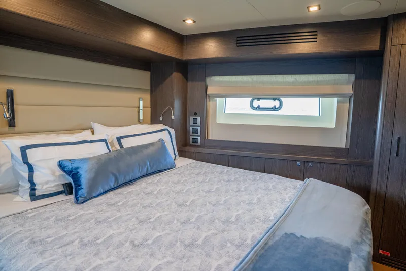 Slide: The Image of Luxurious bedroom interior of 2025 Sirena 58 yacht with elegant bedding and modern design. - 68