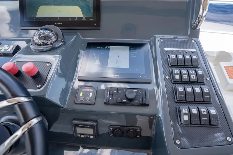 Slide: The Image of Control panel of 2025 Sirena 58 yacht featuring advanced navigation and control systems. - 74