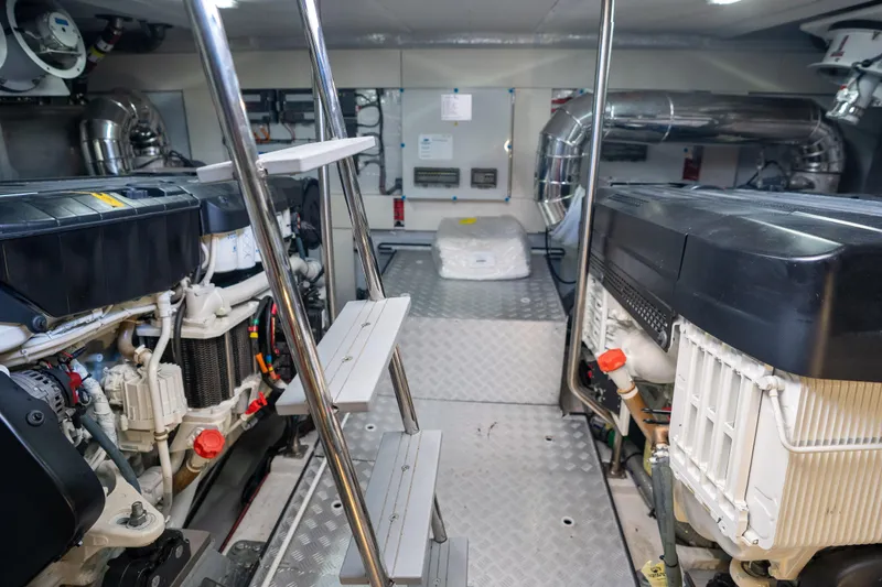 Slide: The Image of Engine room of 2025 Sirena 58 yacht, featuring modern machinery and sleek design. - 77