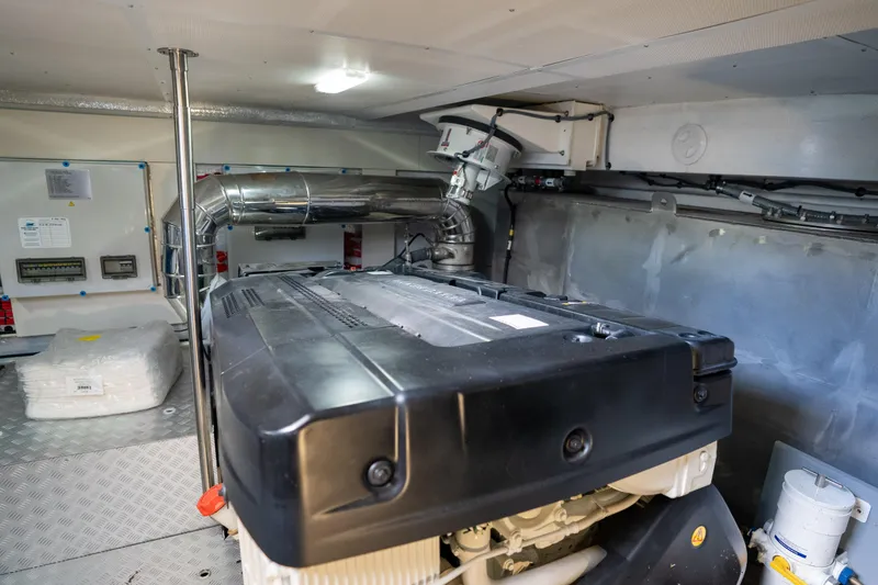 Slide: The Image of Engine room of 2025 Sirena 58 yacht, featuring modern equipment and sleek design. - 79
