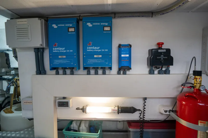 Slide: The Image of Electrical system setup in a 2025 Sirena 58 yacht engine room. - 84