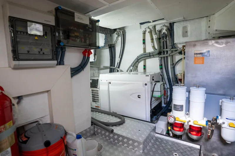 Slide: The Image of Engine room of 2025 Sirena 58 yacht with generator and control panels. - 85