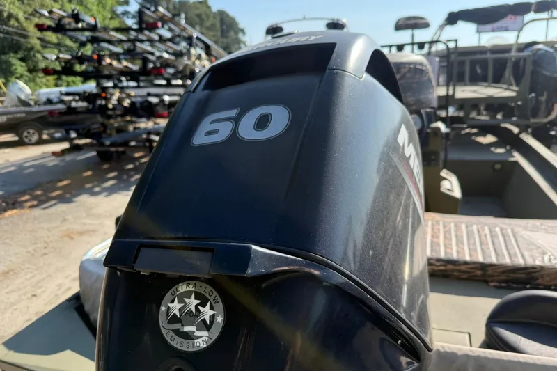 Slide: The Image of 2020 Tracker Grizzly 1860 CC Sportsman boat with Mercury 60 outboard engine. - 10