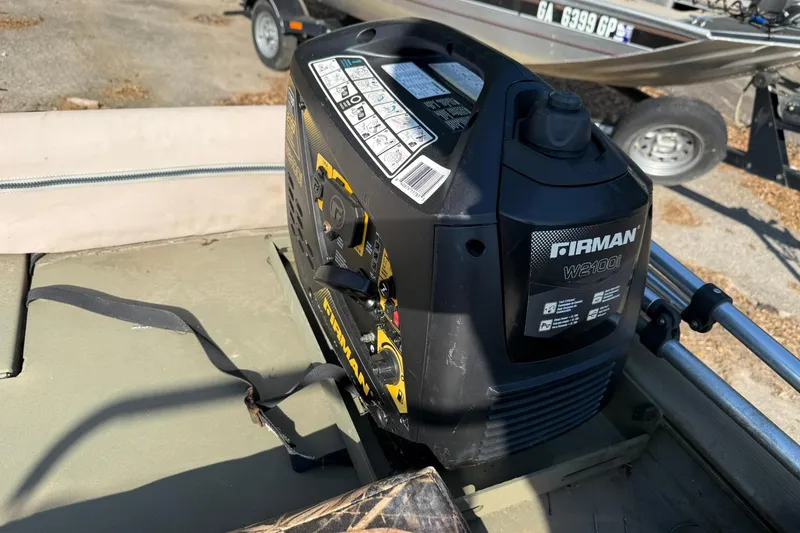 Slide: The Image of Portable Firman generator on a 2020 Tracker Grizzly 1860 CC Sportsman boat. - 7