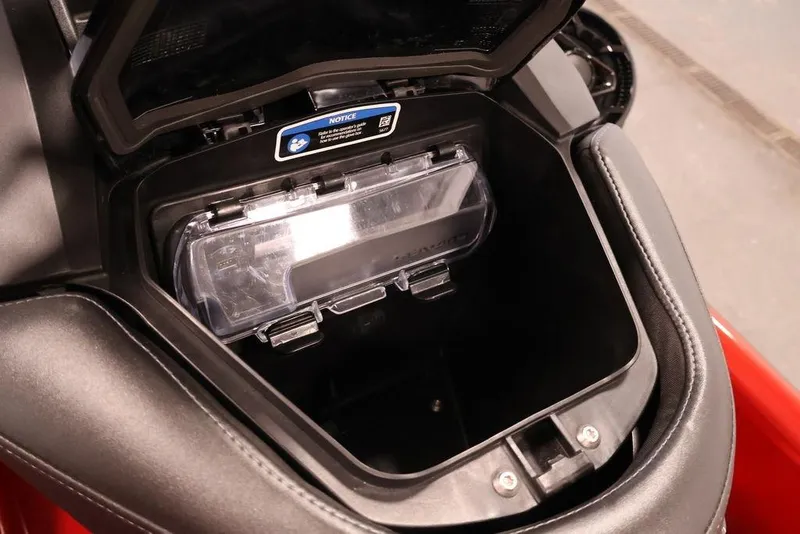 Slide: The Image of Open storage compartment of 2026 Sea-Doo RXP-X 325 watercraft, showcasing interior details. - 20