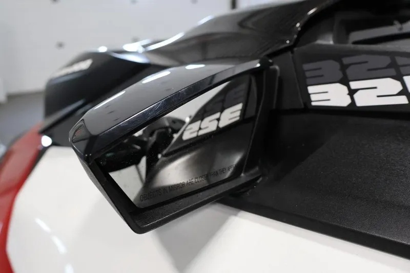 Slide: The Image of Close-up of 2026 Sea-Doo RXP-X 325 mirror with model number reflection. - 4
