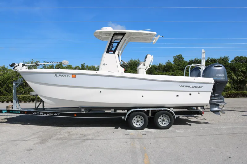 The Image of 2023 World Cat 235 CC boat on trailer, side view, outdoors. - 0