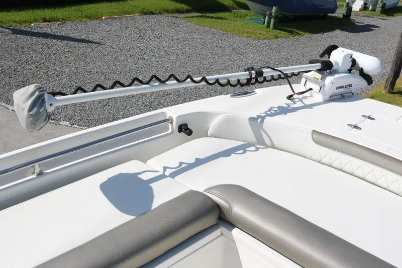 Slide: The Image of 2023 World Cat 235 CC boat with Minn Kota trolling motor on deck. - 10