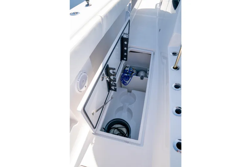 Slide: The Image of Storage compartment on 2025 Front Runner 43 Catamaran, showcasing interior features and equipment. - 12