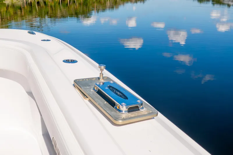 Slide: The Image of Front Runner 43 Catamaran 2025 on calm water, showcasing sleek deck design. - 18