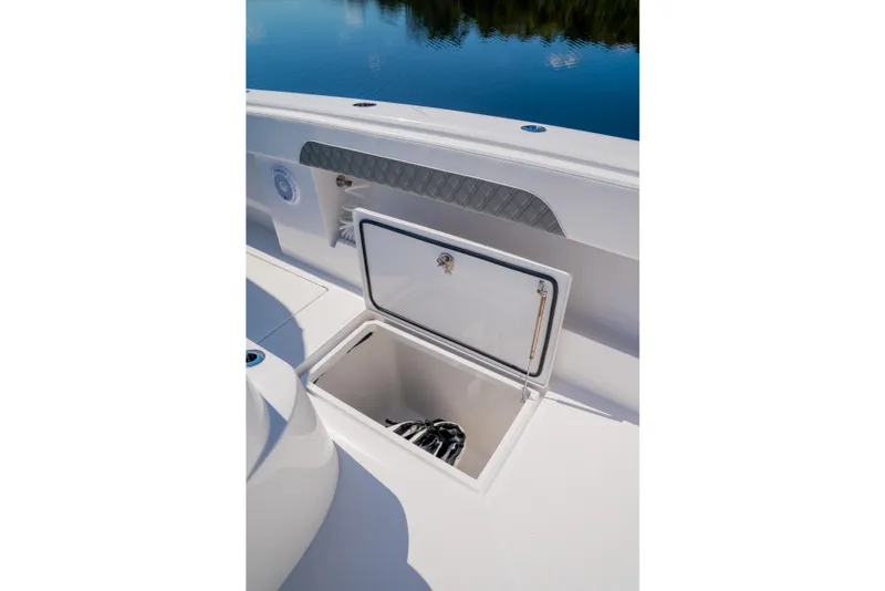 Slide: The Image of Open storage compartment on 2025 Front Runner 43 Catamaran, showcasing sleek design and functionality. - 19