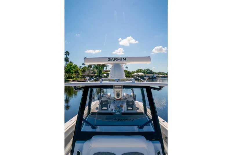 Slide: The Image of 2025 Front Runner 43 Catamaran with Garmin equipment on a sunny day. - 22