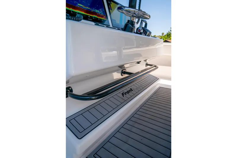 Slide: The Image of 2025 Front Runner 43 Catamaran cockpit with sleek design and advanced navigation equipment. - 31