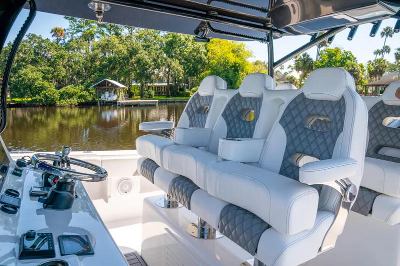 Slide: The Image of Luxurious seating on 2025 Front Runner 43 Catamaran, featuring elegant design and scenic water view. - 35