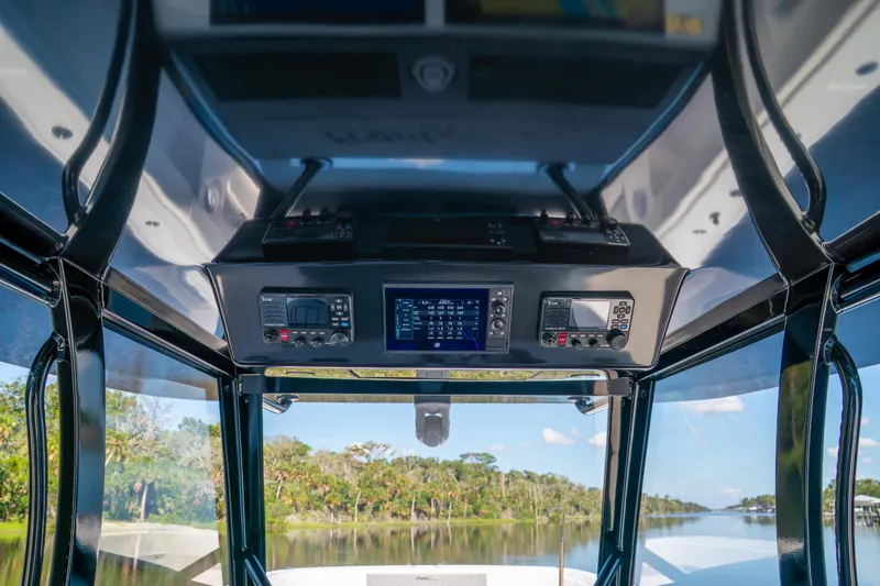 Slide: The Image of Interior view of 2025 Front Runner 43 Catamaran cockpit with advanced navigation systems. - 40