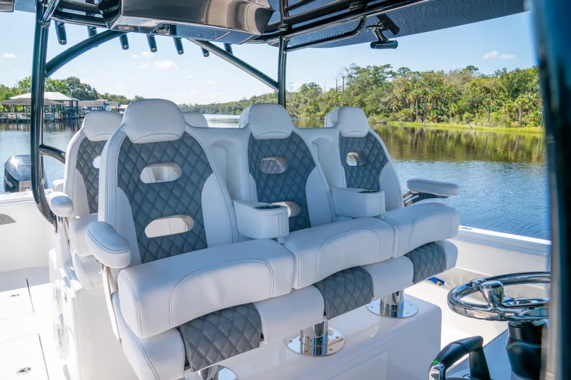 Slide: The Image of Luxurious seating on 2025 Front Runner 43 Catamaran, overlooking serene waterway. - 42