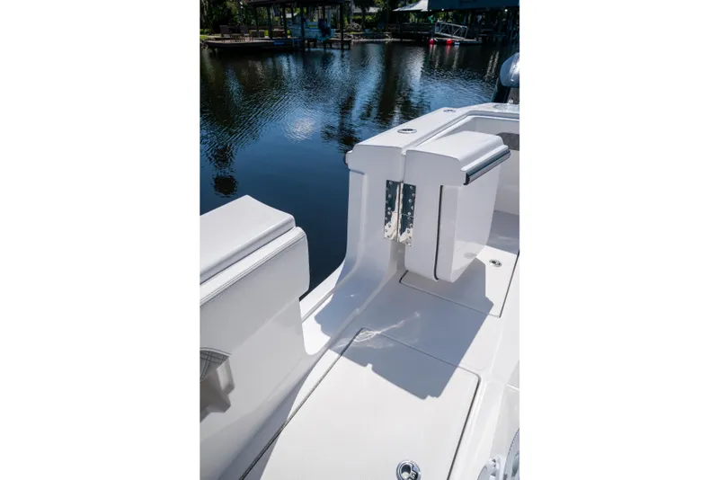 Slide: The Image of 2025 Front Runner 43 Catamaran deck with sleek white seating by the water. - 44