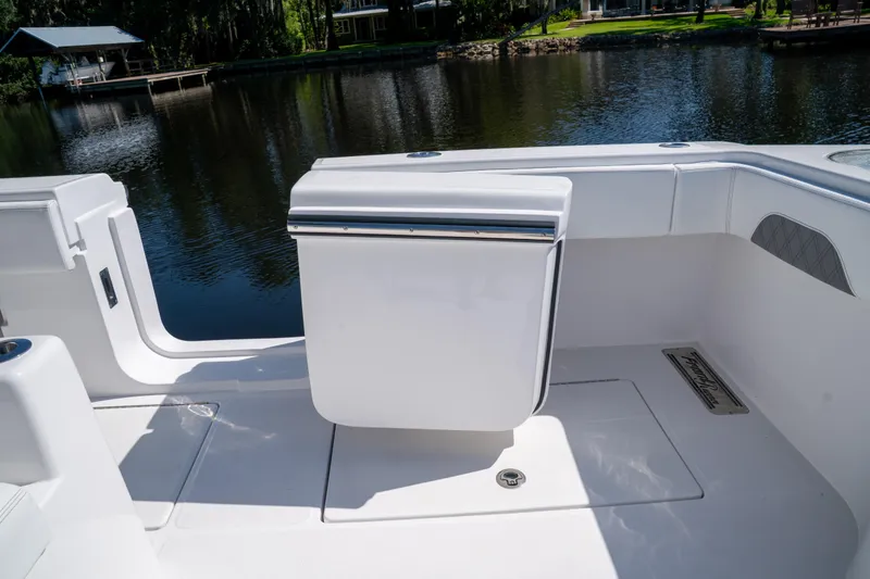 Slide: The Image of 2025 Front Runner 43 Catamaran deck area with sleek seating and water view. - 48