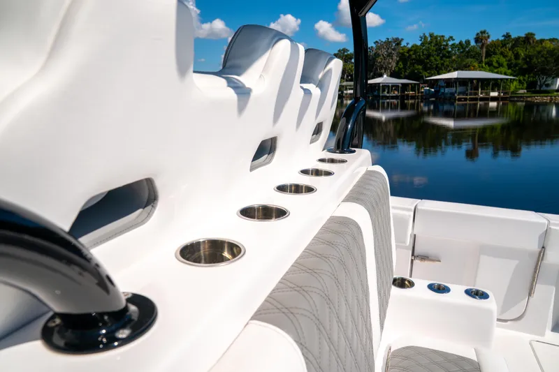 Slide: The Image of Luxurious seating and cup holders on a 2025 Front Runner 43 Catamaran, dockside view. - 5