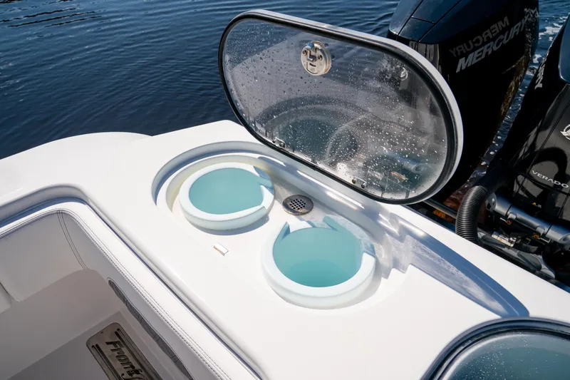 Slide: The Image of Livewell on 2025 Front Runner 43 Catamaran with Mercury engines in background. - 55