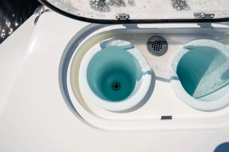 Slide: The Image of Livewell compartments on 2025 Front Runner 43 Catamaran, open lid view. - 58