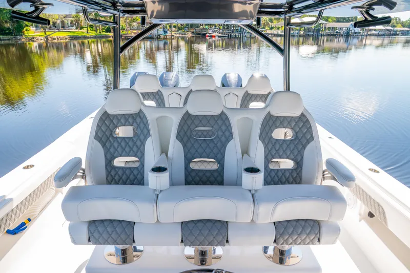 Slide: The Image of Luxurious seating on 2025 Front Runner 43 Catamaran, overlooking serene water. - 6