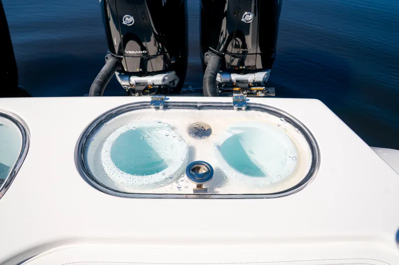 Slide: The Image of Livewell on 2025 Front Runner 43 Catamaran with dual Mercury Verado engines. - 61