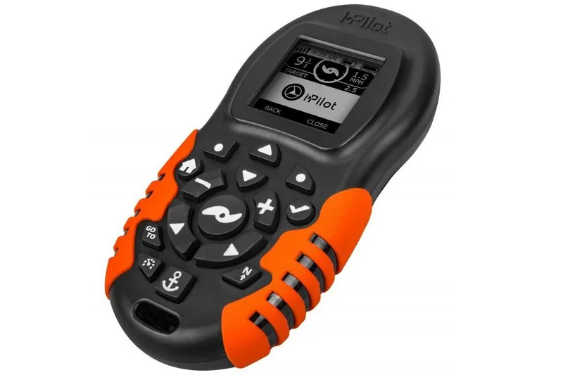 Slide: The Image of Old Town Sportsman Autopilot 120 2023 remote control with orange grips and digital display. - 17