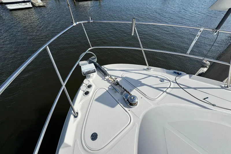 Slide: The Image of Bow of 2006 Sea Ray 44 Sedan Bridge yacht with anchor and railing. - 10