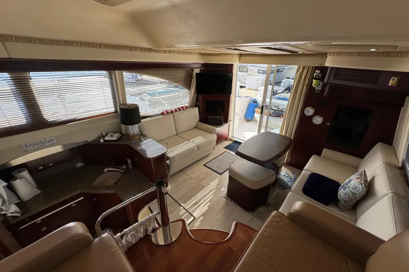 Slide: The Image of Luxurious interior of 2006 Sea Ray 44 Sedan Bridge yacht with modern furnishings. - 16